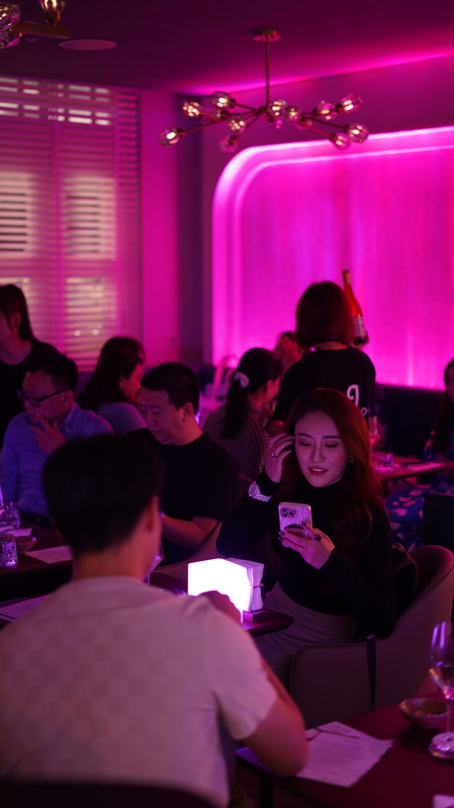 A corporate group sharing an evening at Vinflow