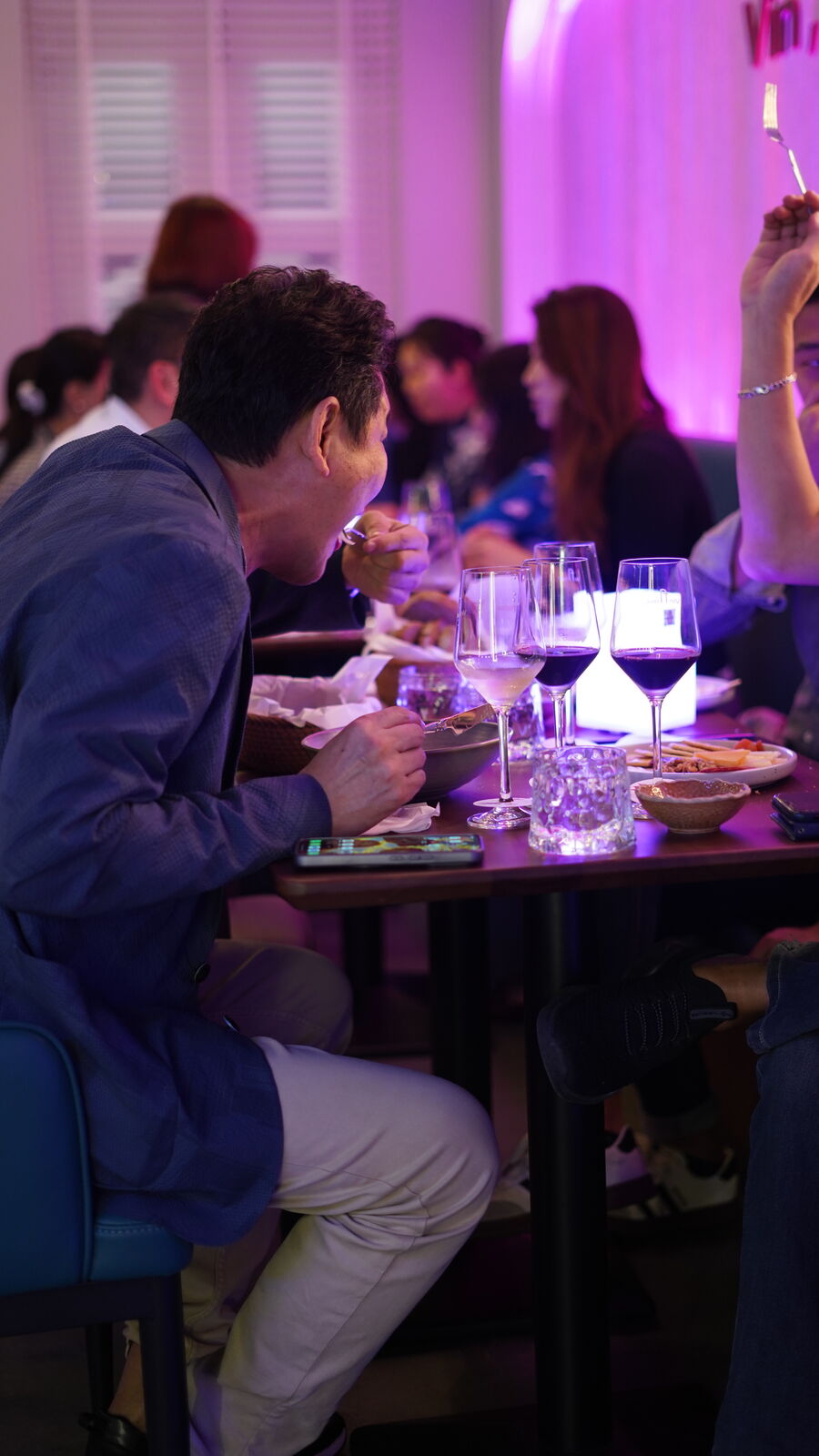 Wine and sharing plates arranged for the table